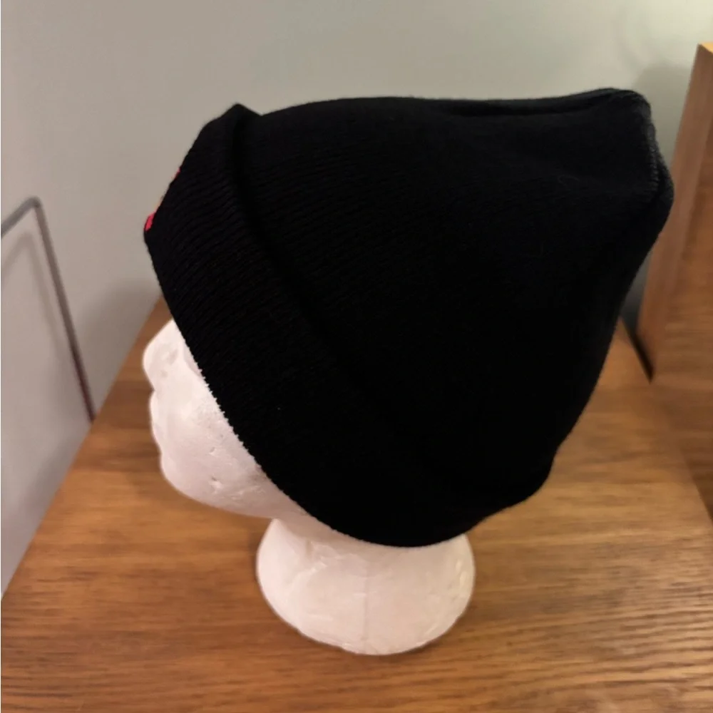 Kids black beanie with a bear wearing a red hat